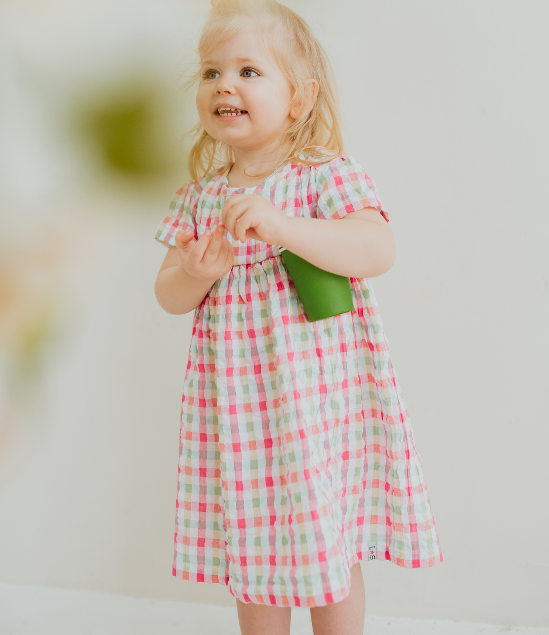model wearing organic cotton Picnic Check Dress