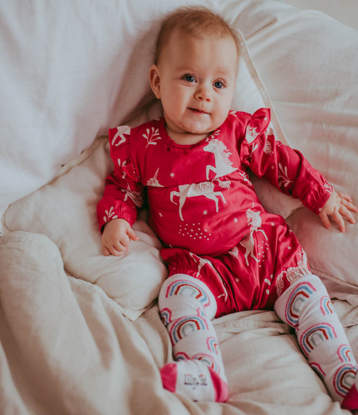baby wearing Organic and sustainable Rainbow Print Tights