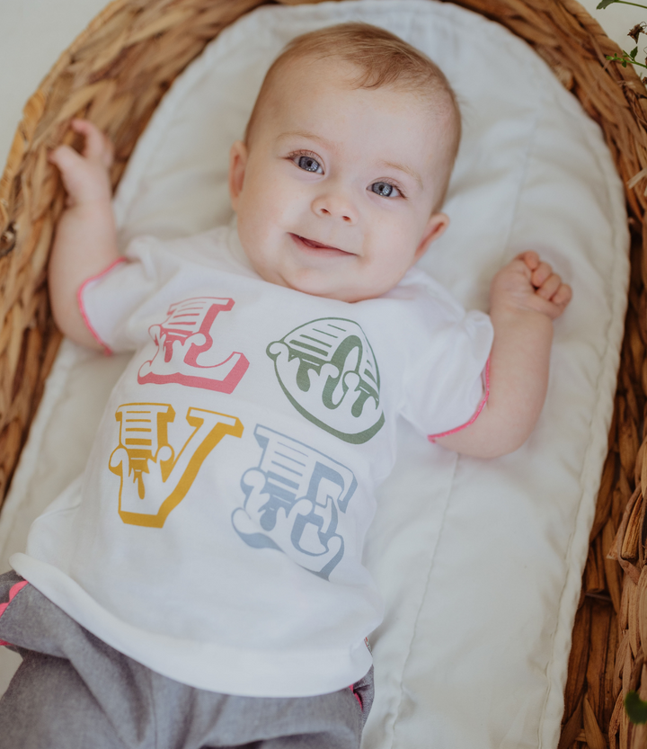 baby wearing organic Love Print Top &  Short Set