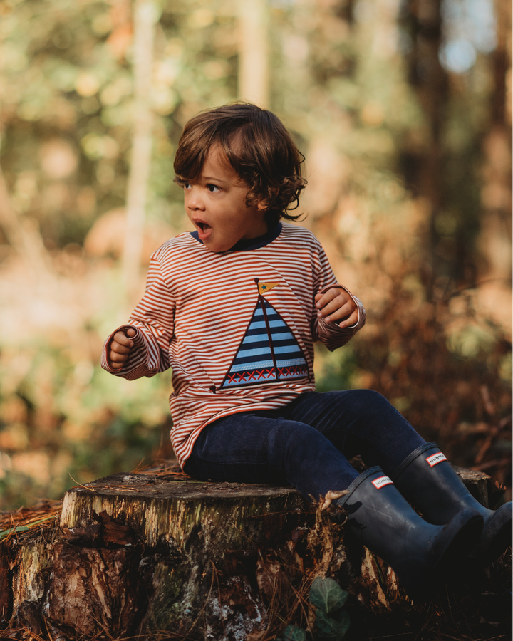 Model wearing organic cotton kids Navy Woven Cord Trousers
