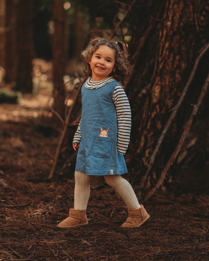 model wearing Kids Lilly + Squirrel Pocket Denim Dress