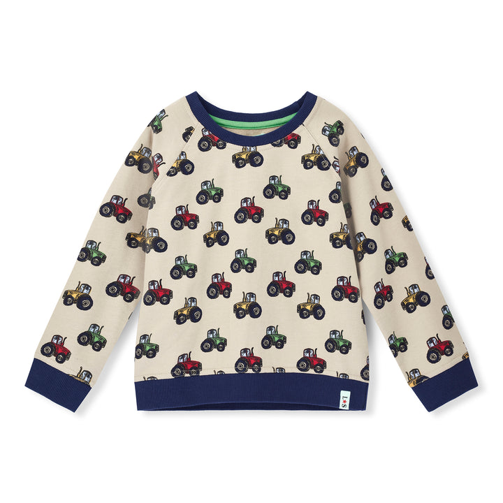 Children's sweater with tractor pattern on a white background