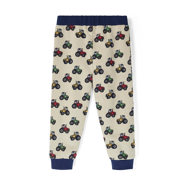 Children's pants with tractor pattern on a white background