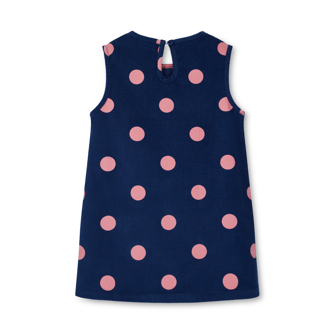 Navy dress with pink polka dots on a white background