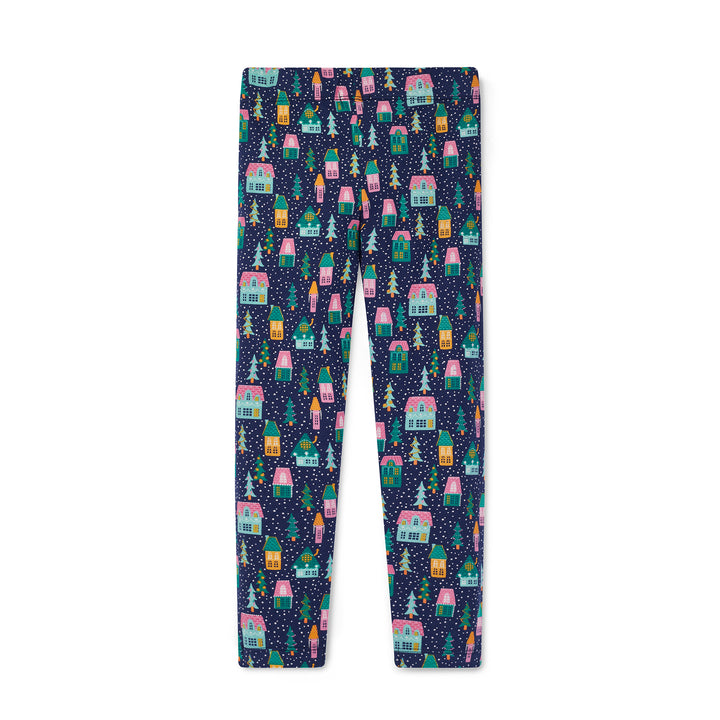 Leggings with a festive village pattern on a white background
