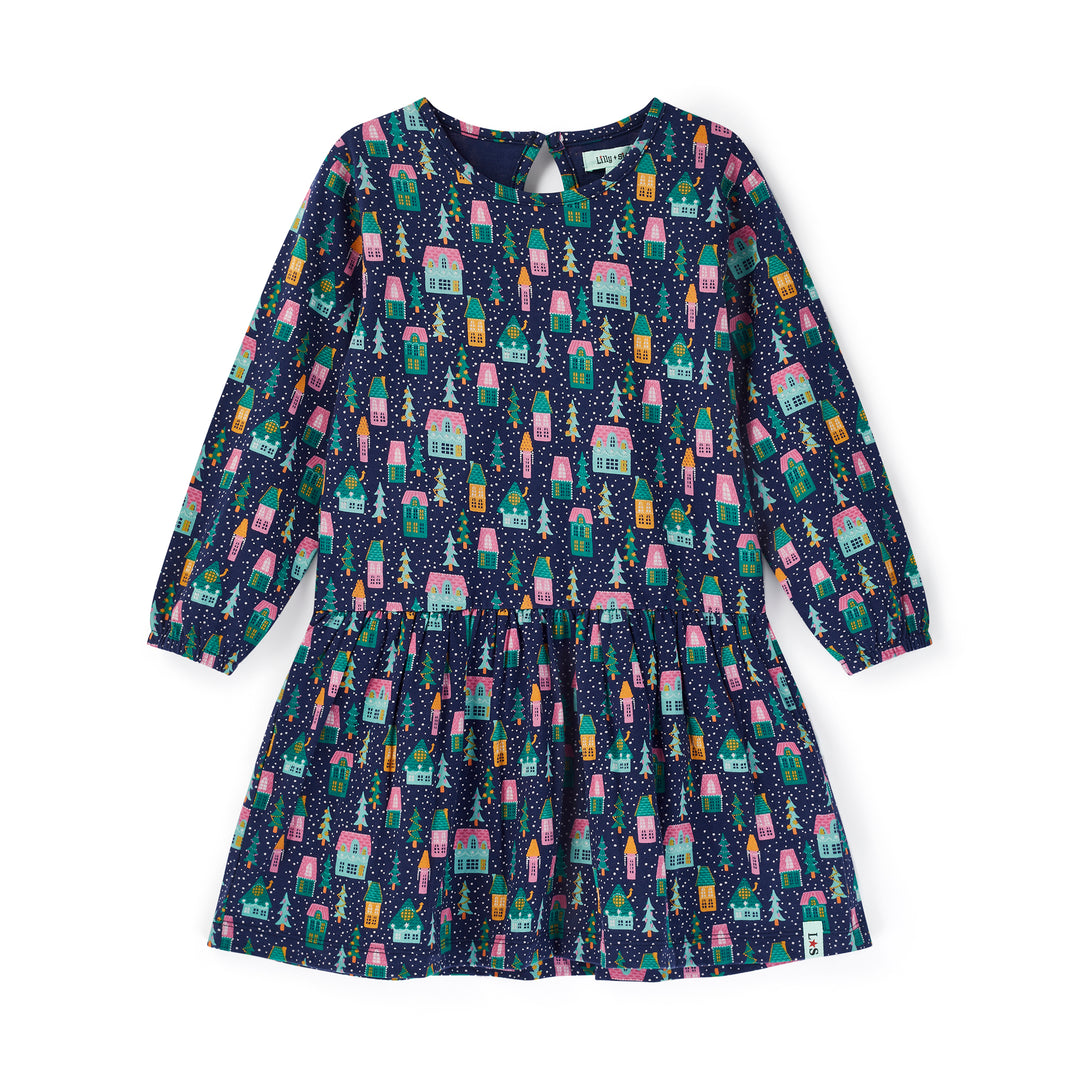 Children's dress with house pattern on a white background
