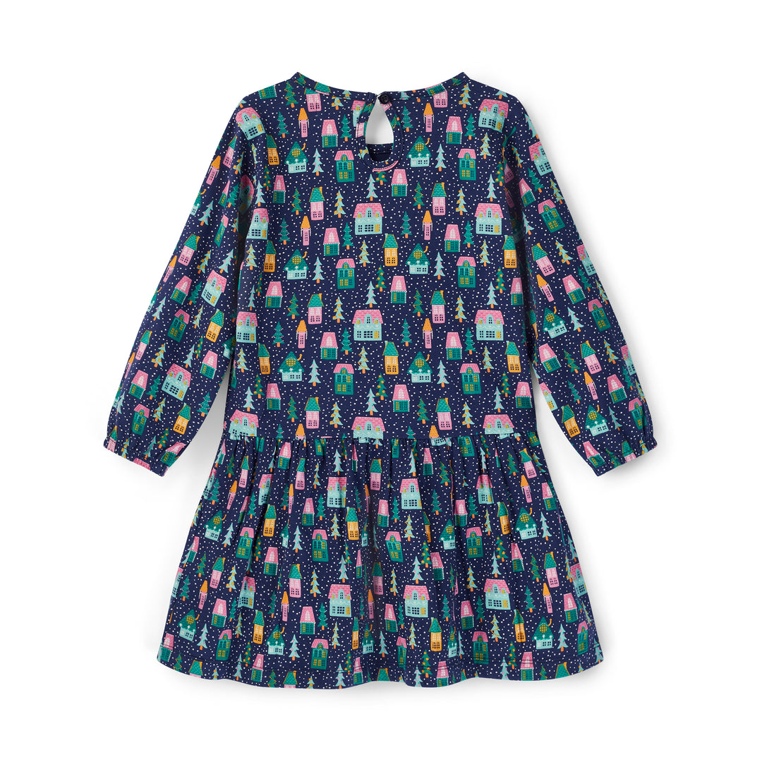 Children's dress with house pattern on a white background