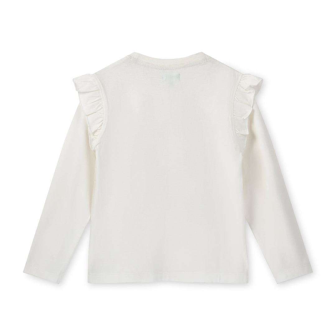 White blouse with ruffled shoulders on a white background