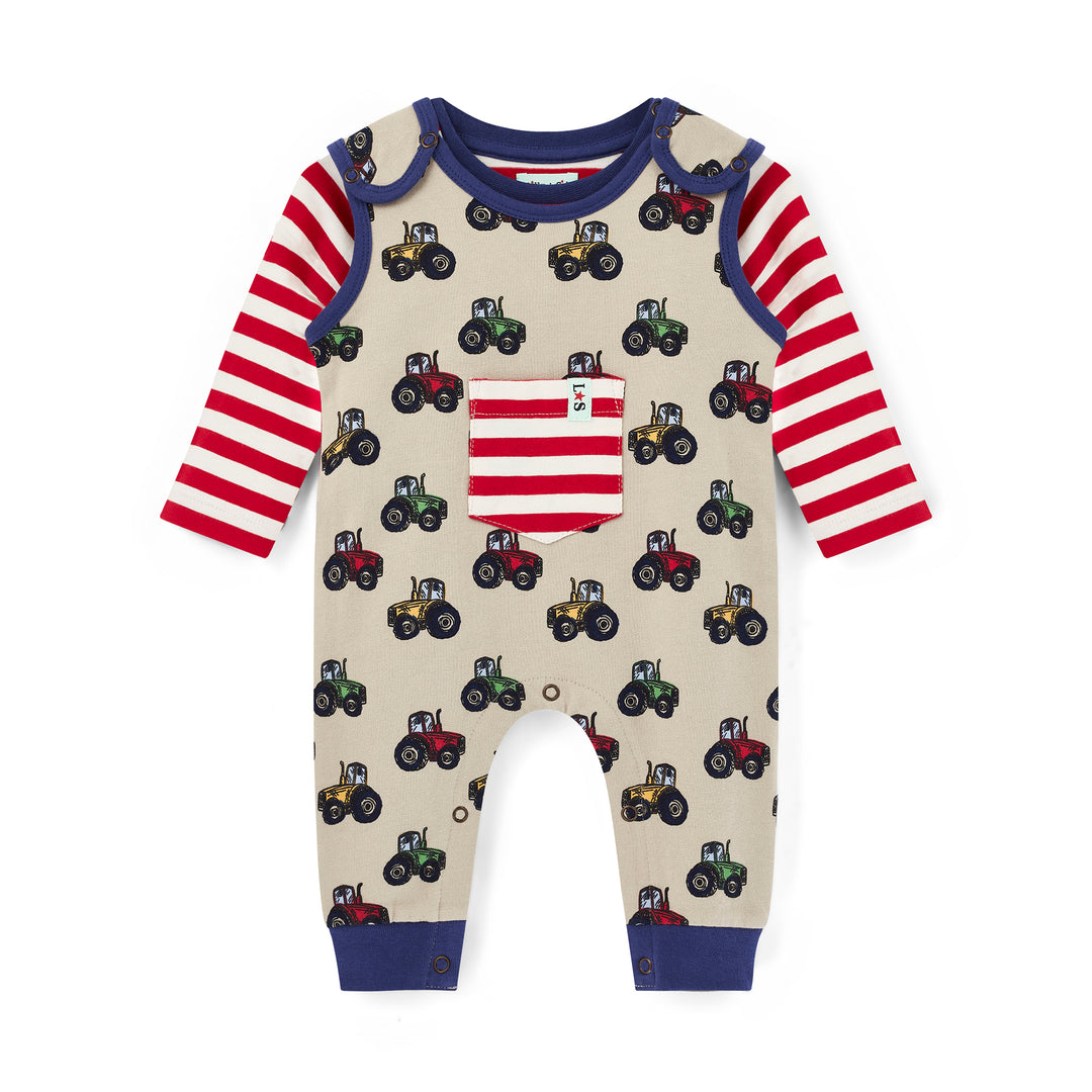 Children's onesie with tractor pattern and red and blue striped sleeves on a white background