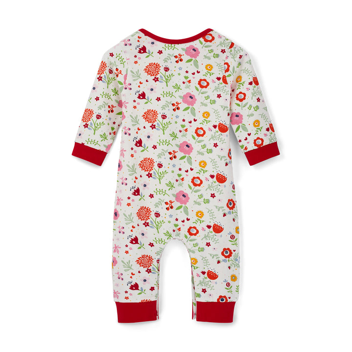 Floral-patterned baby onesie with red cuffs on a white background