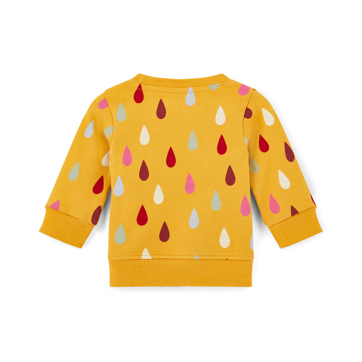 Yellow sweatshirt with colorful raindrop pattern on a white background