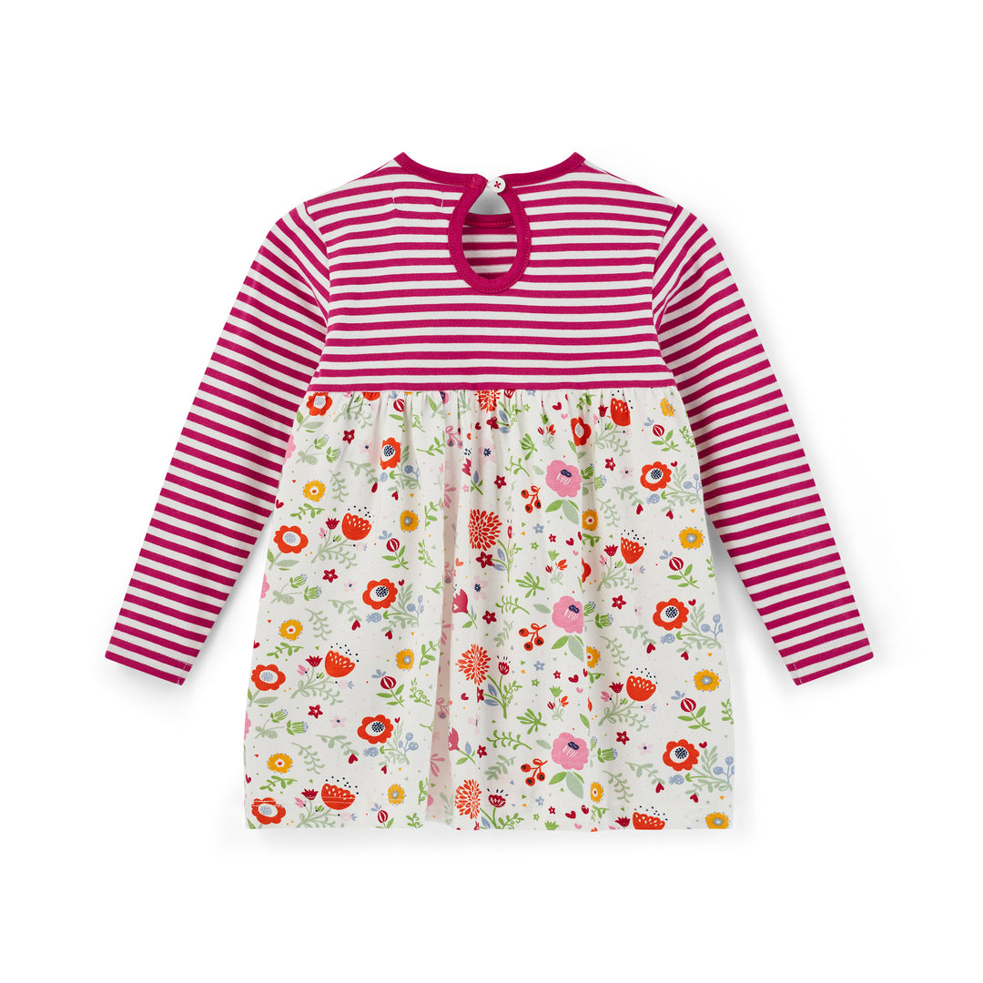 Children's dress with pink and white stripes and floral pattern on a white background