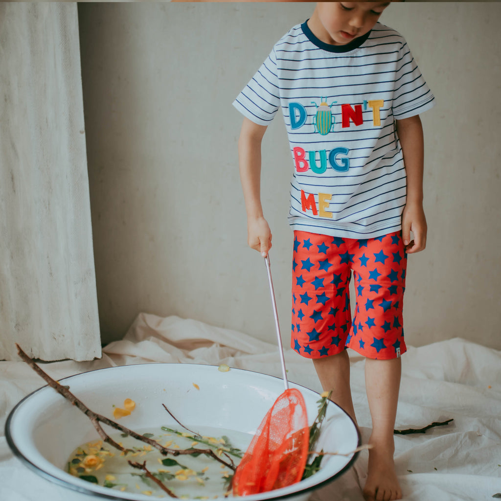 Boy wearing stripe don't bug me t-shirt from Lilly + Sid